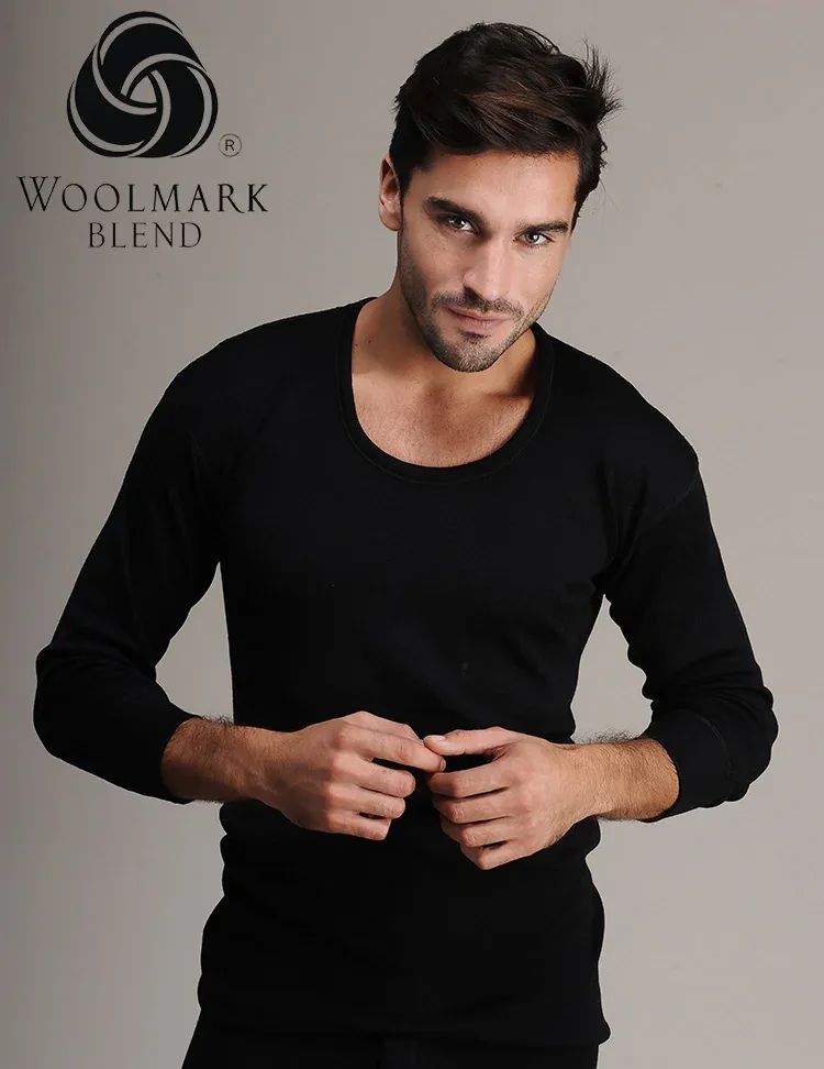 4002%20-%20Men%27s%20Black%20Long%20Sleeve%20Wool%20Undershirt%20-%204002 Woolmark Blend logo and a stylish man wearing a black wool blend sweater, emphasizing quality and fashion.