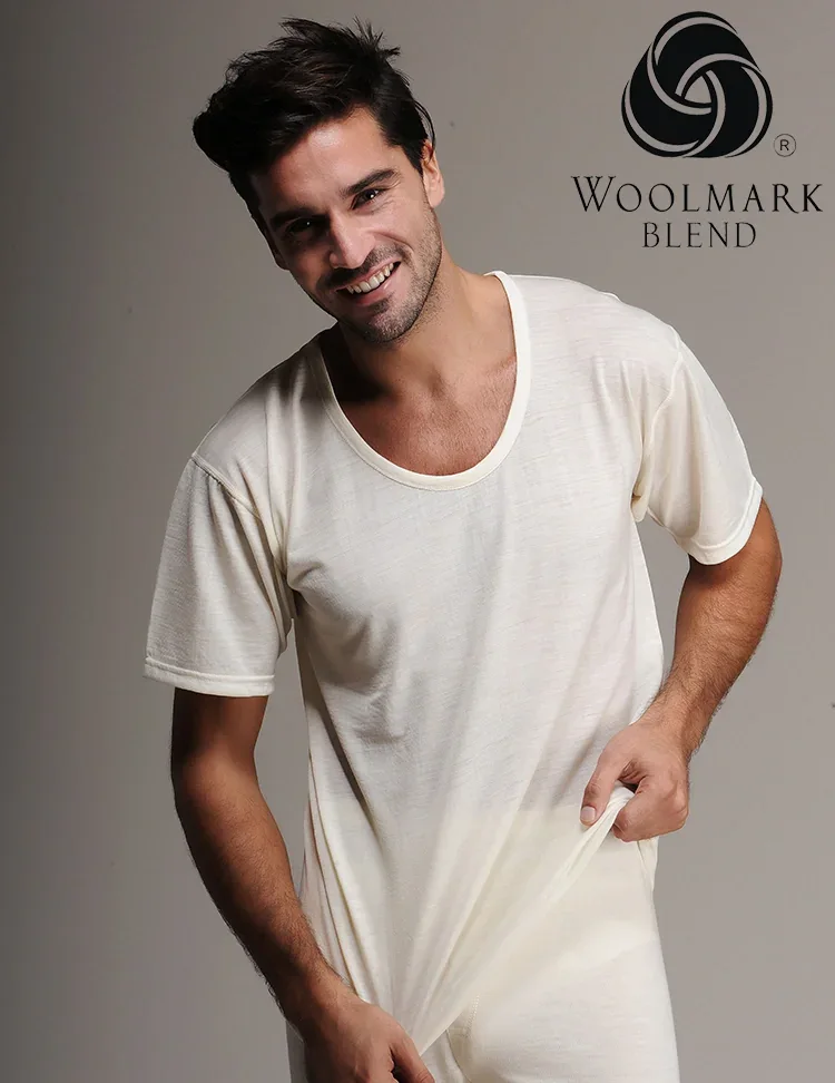601%20-%20Men%27s%20Lightweight%20Wool%20Thermal%20Short%20Sleeve%20%28Moisture%20Wicking%29%20-%20601 Woolmark Blend men's cream-colored casual t-shirt, soft fabric, comfortable fit, ideal for everyday wear, with the Woolmark logo visible in the upper right corner.