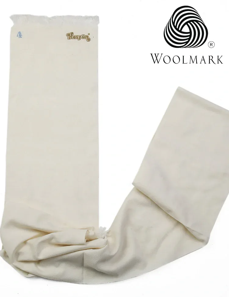 Wool Belt 75% - 7000-1 - 1 Soft white wool blanket in a Woolmark certified packaging, showcasing high-quality Turkish craftsmanship. Ideal for cozy home decor or gifting, with fast shipping from Turkey.