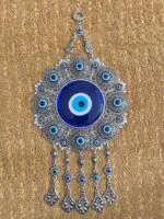 24 evil eyes on silver wall decor
