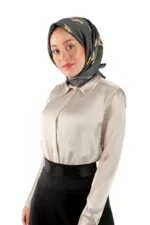 Elegant woman wearing a floral silk headscarf, beige satin blouse, and black skirt, showcasing stylish modest fashion from Turkey, available for fast shipping at Shop of Turkey.