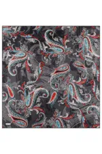 Vibrant paisley pattern fabric in black, red, white, and blue colors, perfect for fashion or home decor projects.