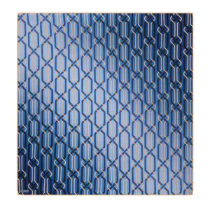 Vibrant geometric blue and gold patterned textile showcasing modern Turkish craftsmanship, perfect for home decor or fashion accessories.