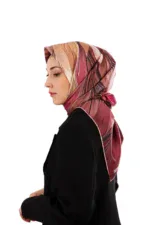 Elegant woman wearing a colorful patterned silk hijab, side profile view, stylish and modest fashion accessory.