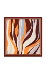 Colorful abstract animal print scarf with orange, brown, beige, and blue tones, suitable for stylish accessories and gift ideas.