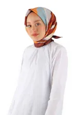 Silk scarf with colorful stripes worn by woman, Turkish fashion accessory, stylish head covering, luxury silk hijab, elegant headscarf from Turkey.