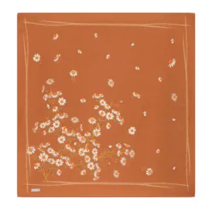 Daisy floral motif on burnt orange fabric, perfect for stylish accessories or home decor from Turkey. Bright white daisies with orange centers create a fresh, vibrant look.