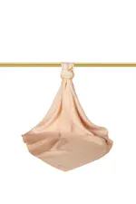 Luxury beige silk scarf tied in a knot on a gold rod, elegant fashion accessory, soft fabric, stylish multicolor scarf displayed on a white background.