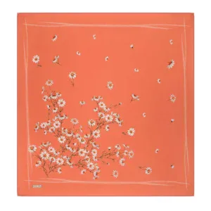 Vibrant coral-colored scarf featuring a delicate white daisy floral pattern with fluttering bees, perfect for a stylish accessory or gift from Turkey.