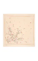 Delicate beige scarf featuring a floral pattern of small white and orange flowers with thin green stems, bordered with a subtle hand-drawn effect for a stylish and elegant look.