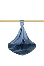 Luxurious blue silk fabric tied with a knot hanging from a golden rod, showcasing elegant craftsmanship. Perfect for high-end fashion, home decor, or style accessories emphasizing quality and sophistication.