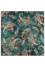 Paisley patterned fabric in shades of teal, white, and orange with intricate floral and swirling details, perfect for scarves, clothing, or home decor.