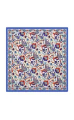 Vibrant Turkish floral patterned scarf with intricate blue, red, and beige designs, perfect for adding a touch of cultural elegance to any outfit.