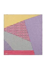 Vibrant geometric patterned scarf with bold stripes and eye-catching colors, perfect for fashion-forward accessories.