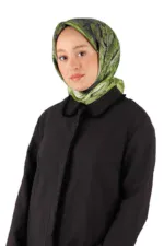 Silk satin headscarf with green and black abstract patterns, stylish and elegant accessory for women from Turkey.
