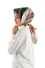 Elegant woman wearing a colorful silk scarf and white blouse, showcasing Turkish fashion accessories available at Shop of Turkey for stylish and authentic look.