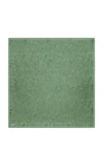 Soft green cutting mat with textured surface, perfect for crafting and sewing projects. Durable and non-slip, ideal for precise work and protecting surfaces during creative activities.