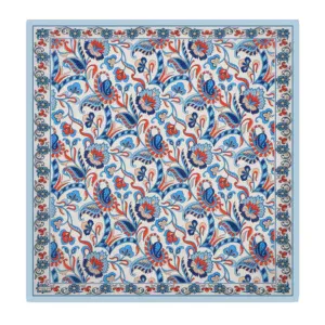 Vibrant traditional Turkish ceramic tile with intricate floral and leaf patterns in blue, red, and beige colors, showcasing authentic Ottoman art and craftsmanship.
