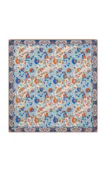 Vibrant Turkish floral patterned rug featuring blue, orange, and white colors, traditional design, perfect for adding an authentic touch to home decor or as a collectible item.