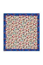 Intricately designed Turkish textile with floral and bird patterns, featuring vibrant red, blue, black, and turquoise colors, framed by a matching decorative border. Perfect for home decor or as a traditional gift.