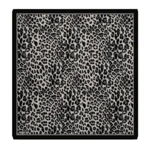 Leopard print silk scarf with black border, stylish accessory for fashion-forward outfits. Made from high-quality silk, perfect for adding bold animal print detail to any wardrobe.
