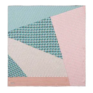 Colorful geometric patterned textile with pink, blue, and white stripes and shapes, perfect for modern home decor or fashion accessories.