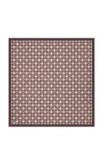 Intricate geometric patterned rug with a traditional Turkish design in shades of brown and beige, perfect for home decor.