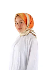 Elegant woman wearing a colorful silk hijab with shades of orange, beige, and cream, paired with a white top, showcasing Turkish fashion and accessories at Shop of Turkey for fast shipping.