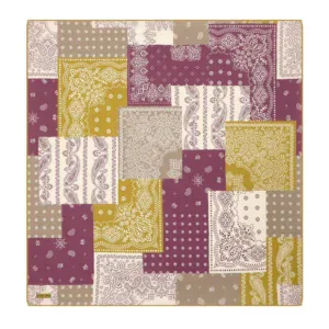 Colorful patchwork bandana scarf with paisley and geometric patterns in purple, beige, white, and yellow. Perfect accessory for casual or boho style outfits.