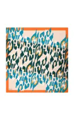 Brightly colored animal-print silk scarf featuring bold blue, orange, black, and beige patterns, perfect for adding a stylish touch to any outfit, available for quick shipping from Turkey.