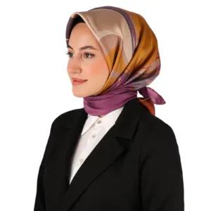 Elegant woman wearing a colorful silk hijab and black blazer, showcasing Turkish fashion and accessories available at Shop of Turkey. Perfect for stylish, modest attire and cultural expression.
