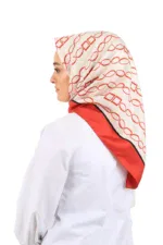 Vibrant silk headscarf with geometric red pattern, stylish accessory for women, versatile fashion piece, perfect for everyday wear or special occasions.