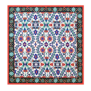 Vibrant Turkish ceramic tile with intricate floral and geometric patterns in blue, red, green, and black, showcasing traditional handcrafted art from Turkey.