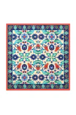 Vibrant Turkish floral and geometric patterned silk scarf with intricate blue, red, green, and white designs, perfect for stylish accessories and cultural decor.
