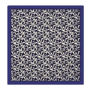 Soft navy and white patterned silk scarf with an intricate geometric design, perfect for stylish accessories and versatile fashion statements.