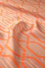 Vivid orange geometric maze pattern on soft, smooth fabric for modern fashion or home décor, showcasing high-quality material and intricate design.