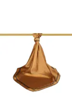 Luxurious gold silk scarf tied around a golden rod, showcasing elegant Turkish textile craftsmanship. Perfect for adding a touch of sophistication to any outfit or home décor.