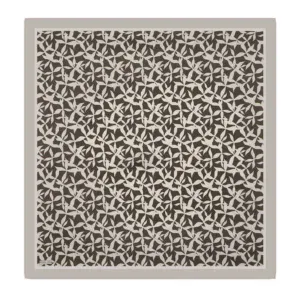 Intricate black and white geometric patterned radiator cover, combining modern design with functional home décor from Turkey.