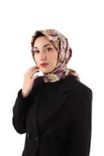 Luxurious silk-patterned hijab styled by a stylish woman, showcasing elegant fashion accessories. Perfect for modern women seeking sophisticated and beautiful headscarves.