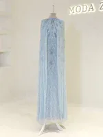 A stunning light blue evening gown adorned with sequins and intricate beadwork, perfect for formal occasions. Showcases detailed craftsmanship with flowing fabric and shimmering embellishments.