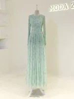 A stunning long gown with intricate sequins, perfect for formal occasions or special events, showcasing luxury fashion from Turkey.