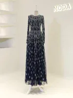 Luxurious navy blue dress with intricate sequin embroidery, long sleeves, and a flowing floor-length skirt, perfect for formal events and special occasions.