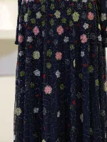 Beaded floral embroidered navy blue dress with colorful accents, perfect for stylish occasions and special events.