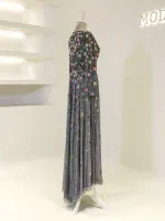 Stylish floral evening dress featuring a layered tulle design adorned with colorful beadwork and embroidery, perfect for formal events and special evenings.