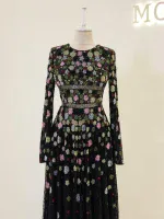 Stunning long-sleeve floral dress featuring intricate embroidery on black fabric, perfect for special occasions and fashionable events.