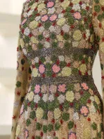 Beaded floral embroidered dress with colorful beaded details, intricate design, perfect for special occasions and celebrations.