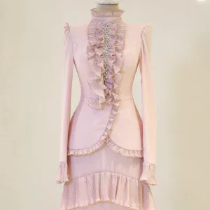 Stylish pink evening dress with ruffles and crystal embellishments, perfect for special occasions and formal events. Made from high-quality fabric, featuring intricate pleats and a sophisticated design.