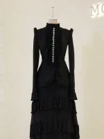 Luxurious black dress featuring intricate ruffles and pearl embellishments, ideal for elegant occasions. Crafted in Turkey, offering high-quality fashion with a timeless appeal.