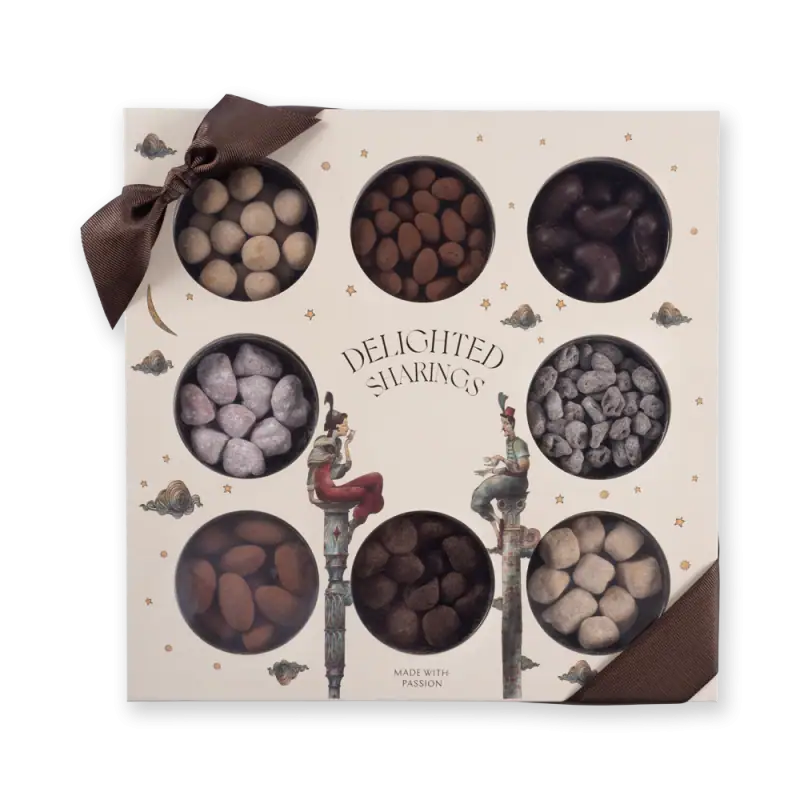 Assorted Turkish delight chocolates gift box with a decorative illustration and a brown bow on top.