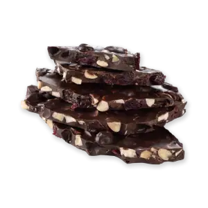 Rich dark chocolate with nuts and dried berries stacked for display, highlighting Turkish quality chocolates available for fast shipping from Shop of Turkey.